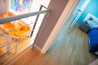 A bed or beds in a room at Relax al Porto - 180 degrees of exciting Garda lake views
