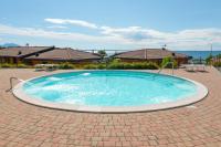 The swimming pool at or close to Relax al Porto - 180 degrees of exciting Garda lake views