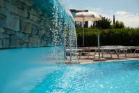The swimming pool at or close to Relax al Porto - 180 degrees of exciting Garda lake views