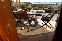 A balcony or terrace at Relax al Porto - 180 degrees of exciting Garda lake views