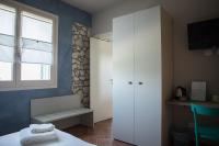 A bed or beds in a room at B&B Casa Campagnari