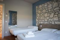A bed or beds in a room at B&B Casa Campagnari