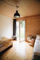 Postel nebo postele na pokoji v ubytování Domesi Concept House Pulečný