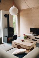 TV a/nebo společenská místnost v ubytování Domesi Concept House Pulečný