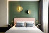 A bed or beds in a room at Hotel Forte del 48