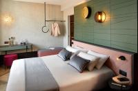 A bed or beds in a room at Hotel Forte del 48