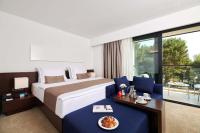 Posteľ alebo postele v izbe v ubytovaní Hotel Parentium Plava Laguna