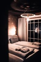 Łóżko lub łóżka w pokoju w obiekcie HOTEL SEPP - Alpine Boutique Hotel - Adults Only ab 21 Jahre
