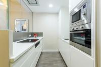 A kitchen or kitchenette at MD Pelayo