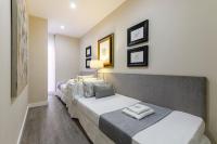 A bed or beds in a room at MD Pelayo