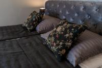 Posteľ alebo postele v izbe v ubytovaní Luxury Peitho Residence