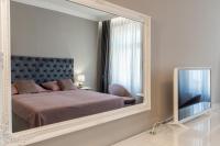 Posteľ alebo postele v izbe v ubytovaní Luxury Peitho Residence
