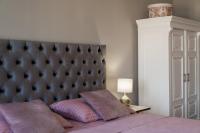 Posteľ alebo postele v izbe v ubytovaní Luxury Peitho Residence