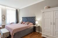 Posteľ alebo postele v izbe v ubytovaní Luxury Peitho Residence