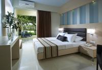 Posteľ alebo postele v izbe v ubytovaní Eleftheria Hotel