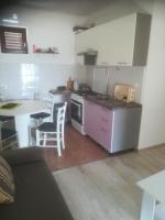 Kuchyň nebo kuchyňský kout v ubytování Apartmani Huljev