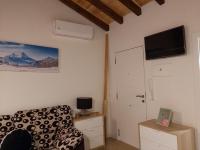 TV a/nebo společenská místnost v ubytování Habitaciones boutiques