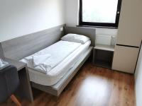 Postel nebo postele na pokoji v ubytování Rooms Ambrožič