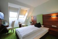 Posteľ alebo postele v izbe v ubytovaní ACHAT Hotel Budapest