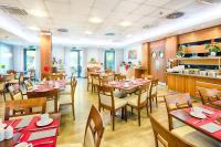 Reštaurácia alebo iné gastronomické zariadenie v ubytovaní ACHAT Hotel Budapest