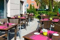 Reštaurácia alebo iné gastronomické zariadenie v ubytovaní ACHAT Hotel Budapest