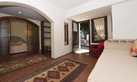 A bed or beds in a room at Villa Konak Hotel