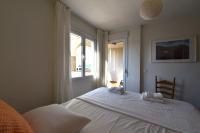 Postel nebo postele na pokoji v ubytování Beach House Villa Roca
