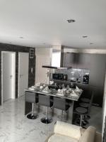 Kuchyňa alebo kuchynka v ubytovaní Swiss Luxury Apartment