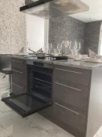 Kuchyňa alebo kuchynka v ubytovaní Swiss Luxury Apartment