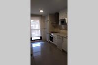 Kuchyň nebo kuchyňský kout v ubytování Apartamento Lerele