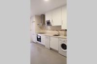 Kuchyň nebo kuchyňský kout v ubytování Apartamento Lerele