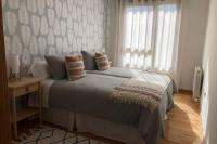 Postel nebo postele na pokoji v ubytování Apartamento Lerele