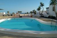 Bazén v ubytování Los Arcos 304, Puerto del Carmen Lanzarote nebo v jeho okolí