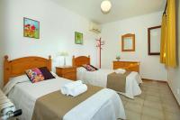 A bed or beds in a room at Villa Gotmar by Sealand Villas