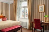 Postel nebo postele na pokoji v ubytování Hotel Paris Prague