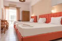 Posteľ alebo postele v izbe v ubytovaní Nikos Rooms