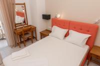 Posteľ alebo postele v izbe v ubytovaní Nikos Rooms