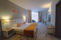 Postel nebo postele na pokoji v ubytování Park Hotel Odessos - All Inclusive