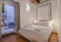 Posteľ alebo postele v izbe v ubytovaní Palazzo Marigliano - Rooms & Suites