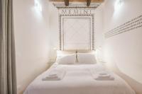 Posteľ alebo postele v izbe v ubytovaní Palazzo Marigliano - Rooms & Suites