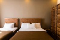 A bed or beds in a room at Taksim Mood