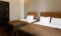 A bed or beds in a room at Taksim Mood