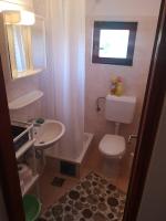 Kúpeľňa v ubytovaní Apartmani Pilon