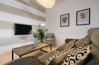 TV a/nebo společenská místnost v ubytování Encarnación Suite Apartment