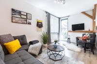 Telewizja i/lub zestaw kina domowego w obiekcie Apartamenty Granitica Zakopane