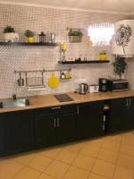 Kuchyň nebo kuchyňský kout v ubytování Apartment Anglicka 138