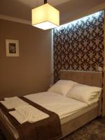 Posteľ alebo postele v izbe v ubytovaní Hotel Kamiza