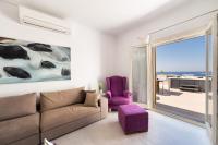 A seating area at Panos Villa Sunset View