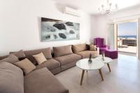 A seating area at Panos Villa Sunset View