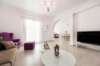 A television and/or entertainment centre at Panos Villa Sunset View